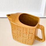 Barbotine ceramic pitcher