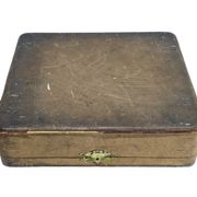 12 silver-plated metal knife handles, in a case.
