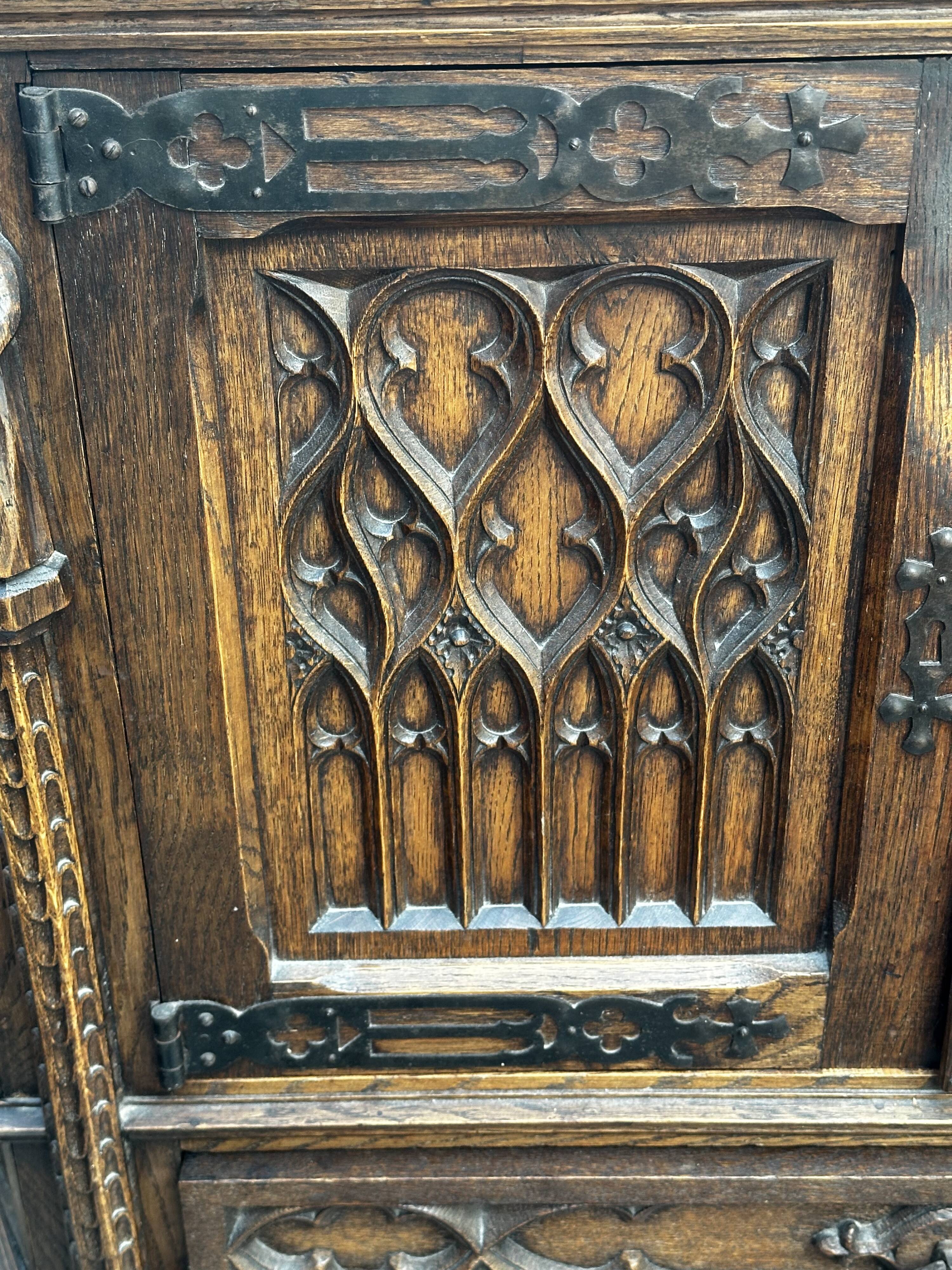 Pair of Gothic style cabinets in dark oak from the 19th century.