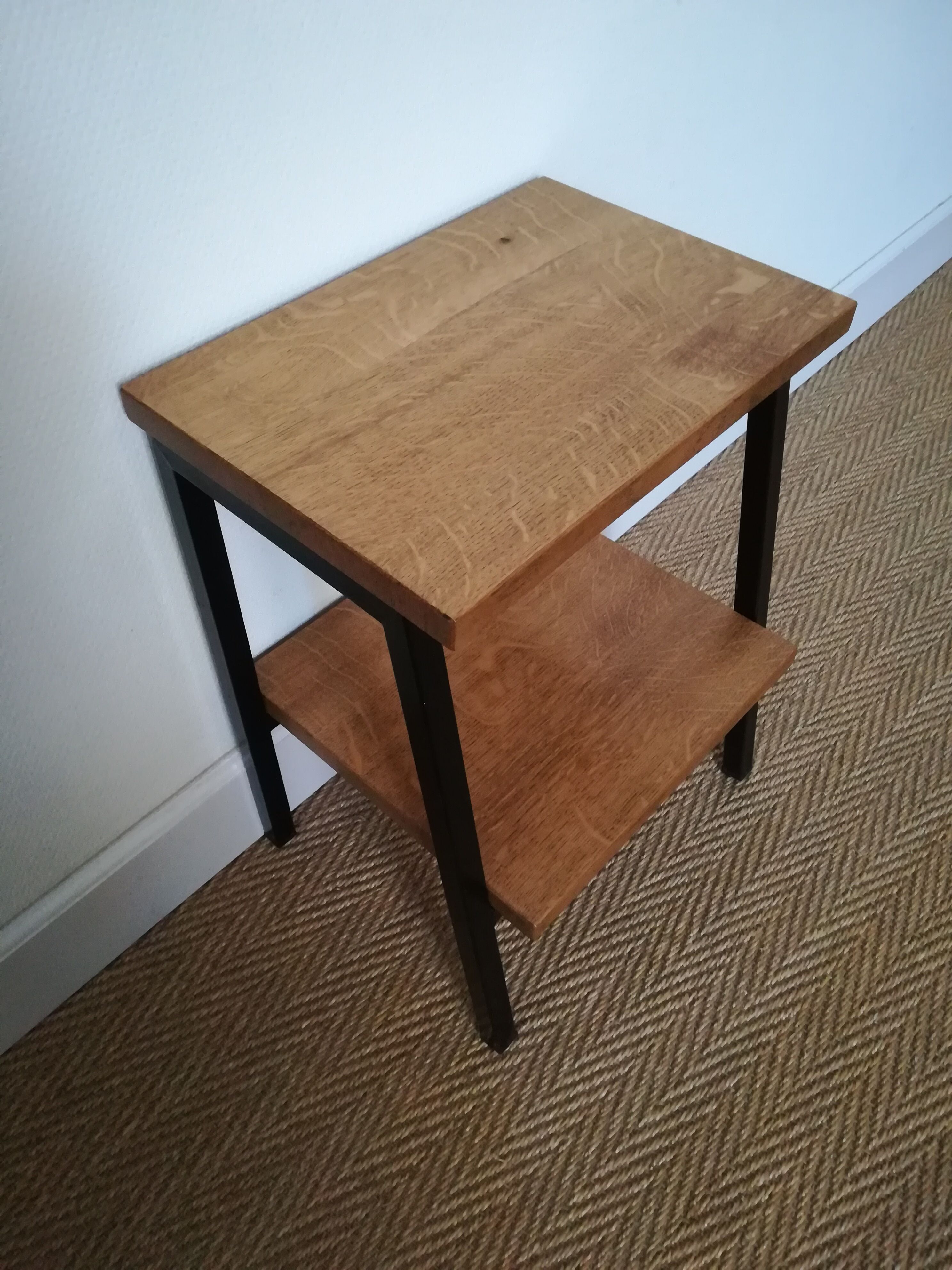 A pair of bedside tables