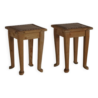 A pair of antique Danish pine stools from the late 19th century.