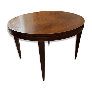 Impeccable mahogany round table from the 1950s.