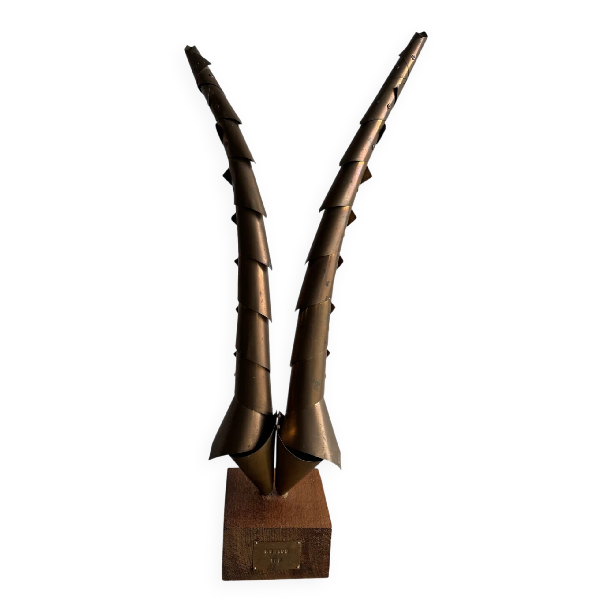 Golden brass sculptural horns on wooden base — modern metal art sculpture, 68.5 cm high