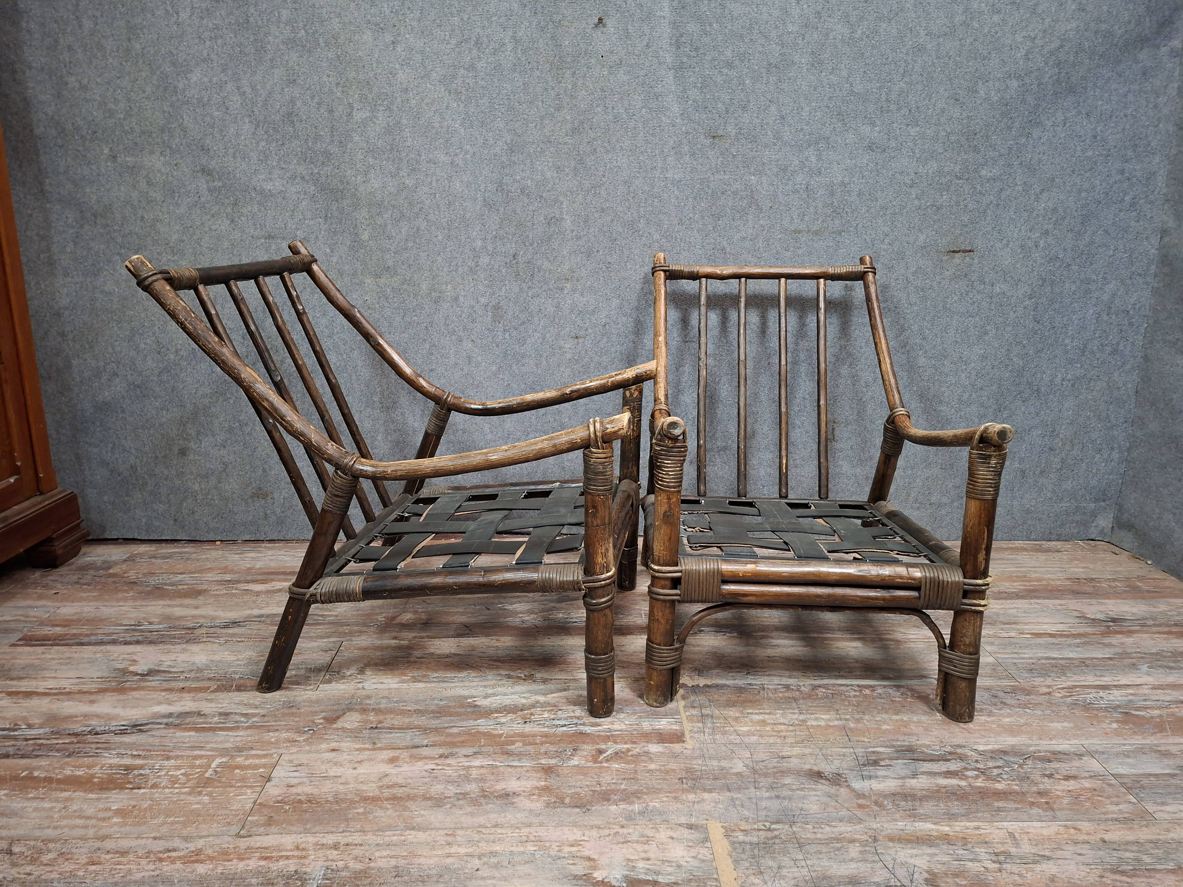 Pair of low bamboo armchairs with an exotic spirit, dating from the early 20th century.