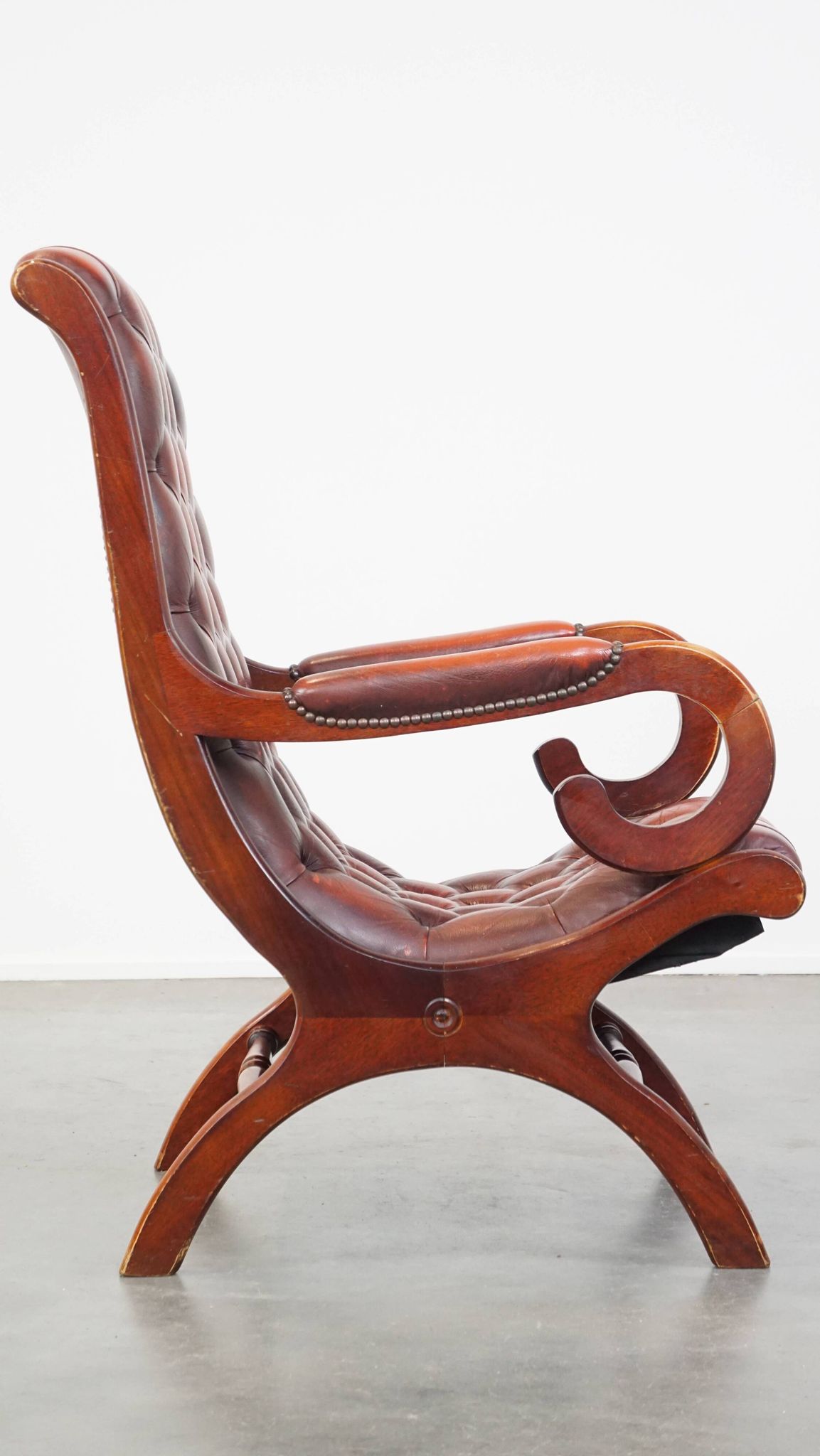 Red cowhide leather English Chesterfield armchair combined with wood