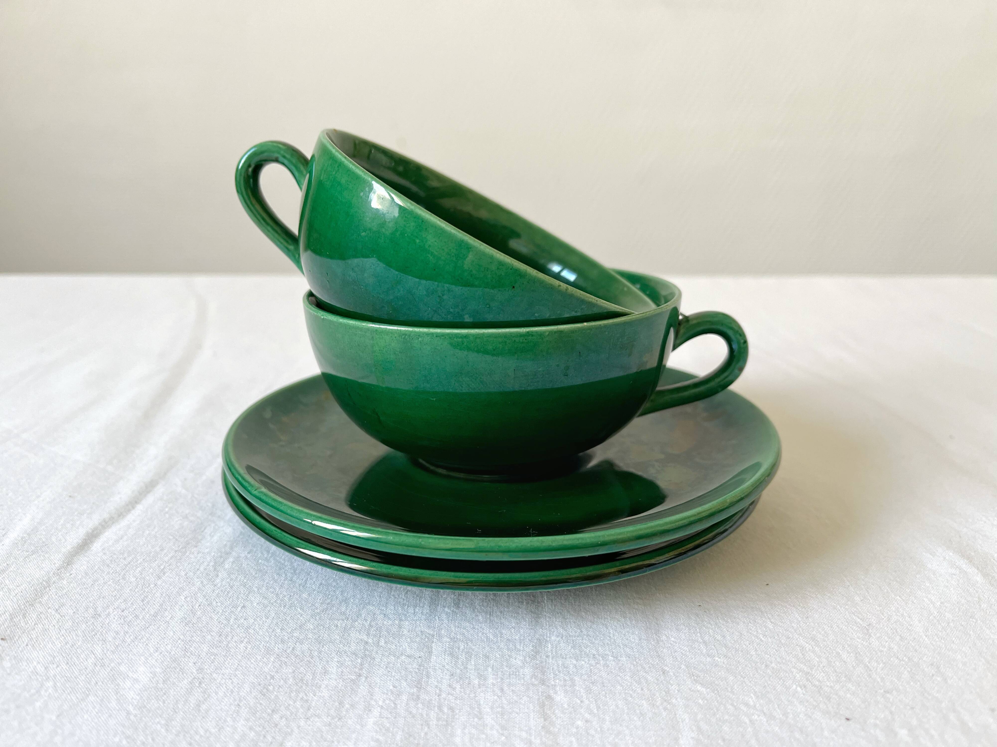 2 old green coffee cups in earthenware of Saint Clement