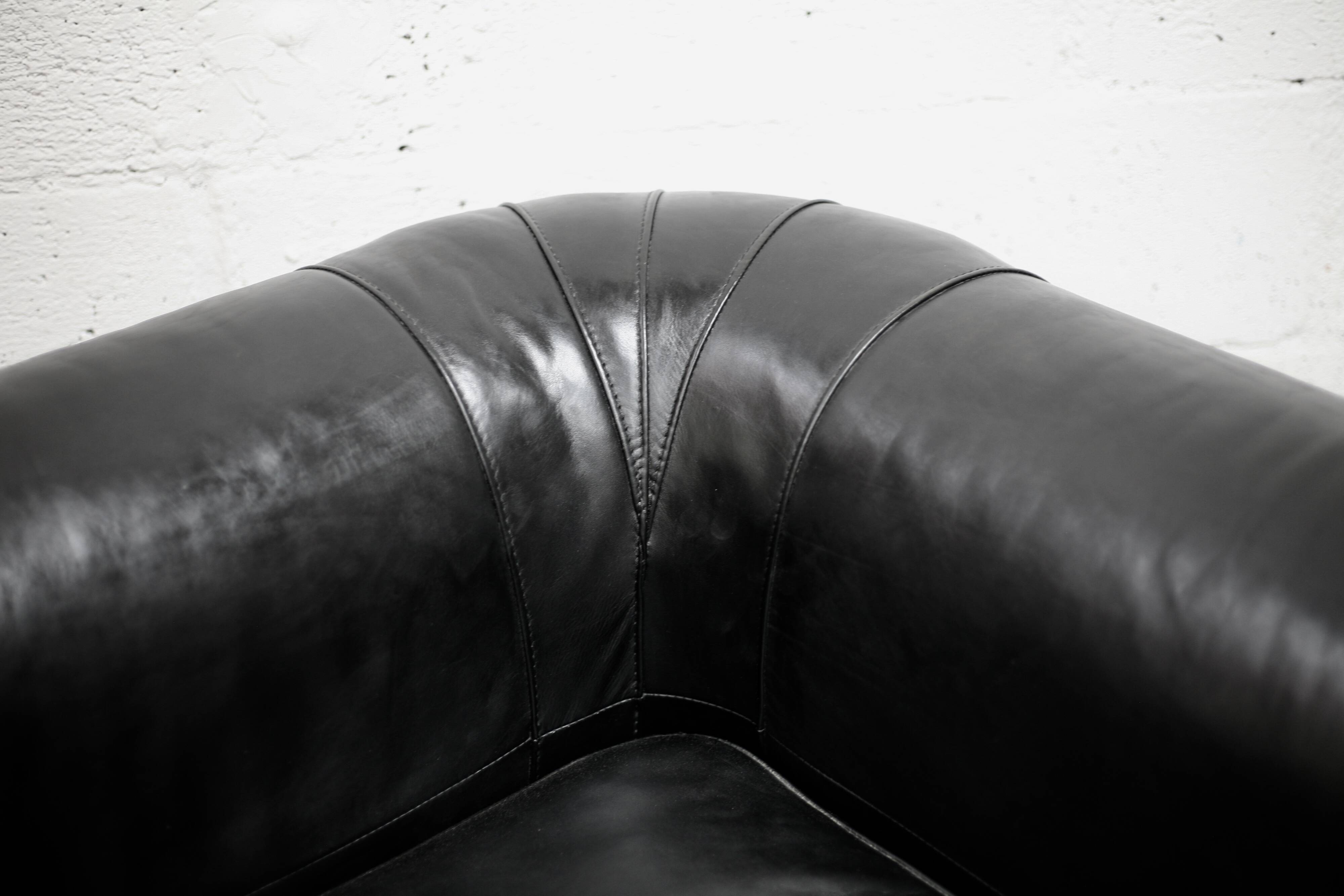 Large black leather armchair, France, 1980s