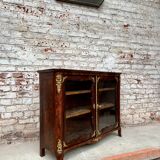 Low showcase in rosewood veneer of the regency xviii th century