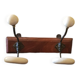 Ceramic and walnut coat rack. The 50's.