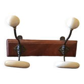Ceramic and walnut coat rack. The 50's.