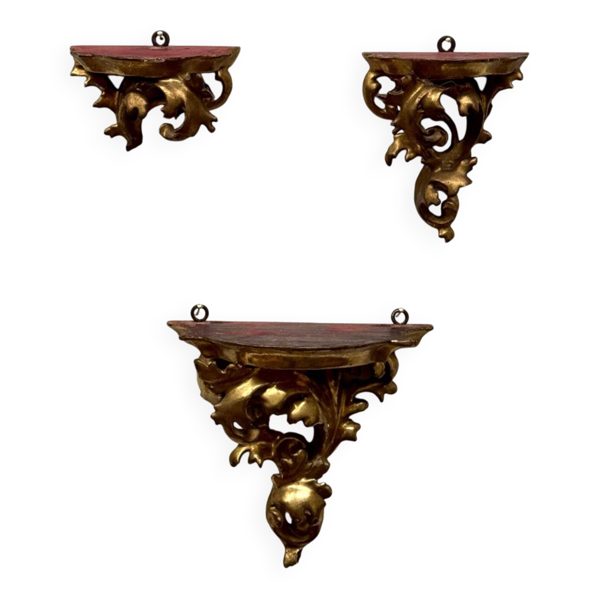 Set of three gilded wood consoles in Rococo style, late 19th century.