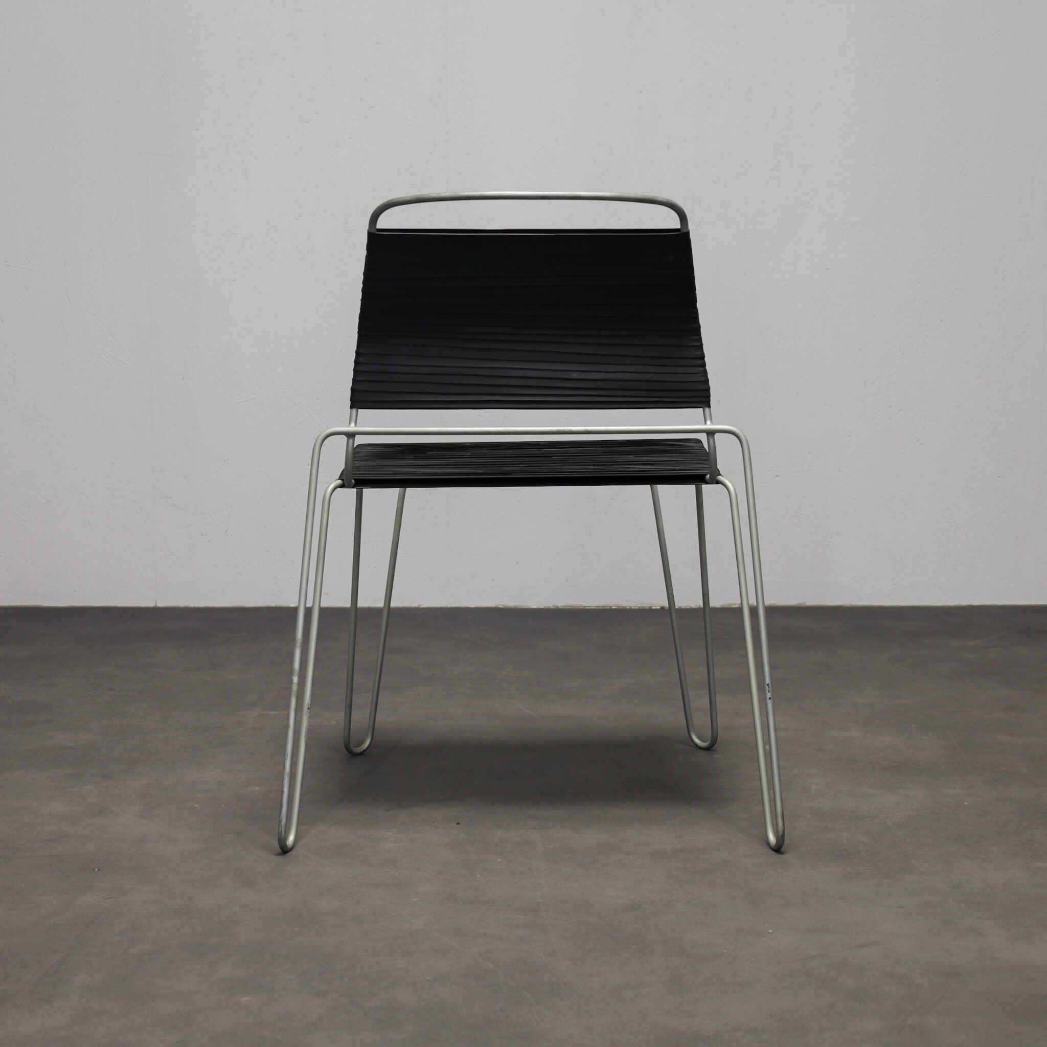 Rare pair of “Rubber Band” chairs by Tom Dixon