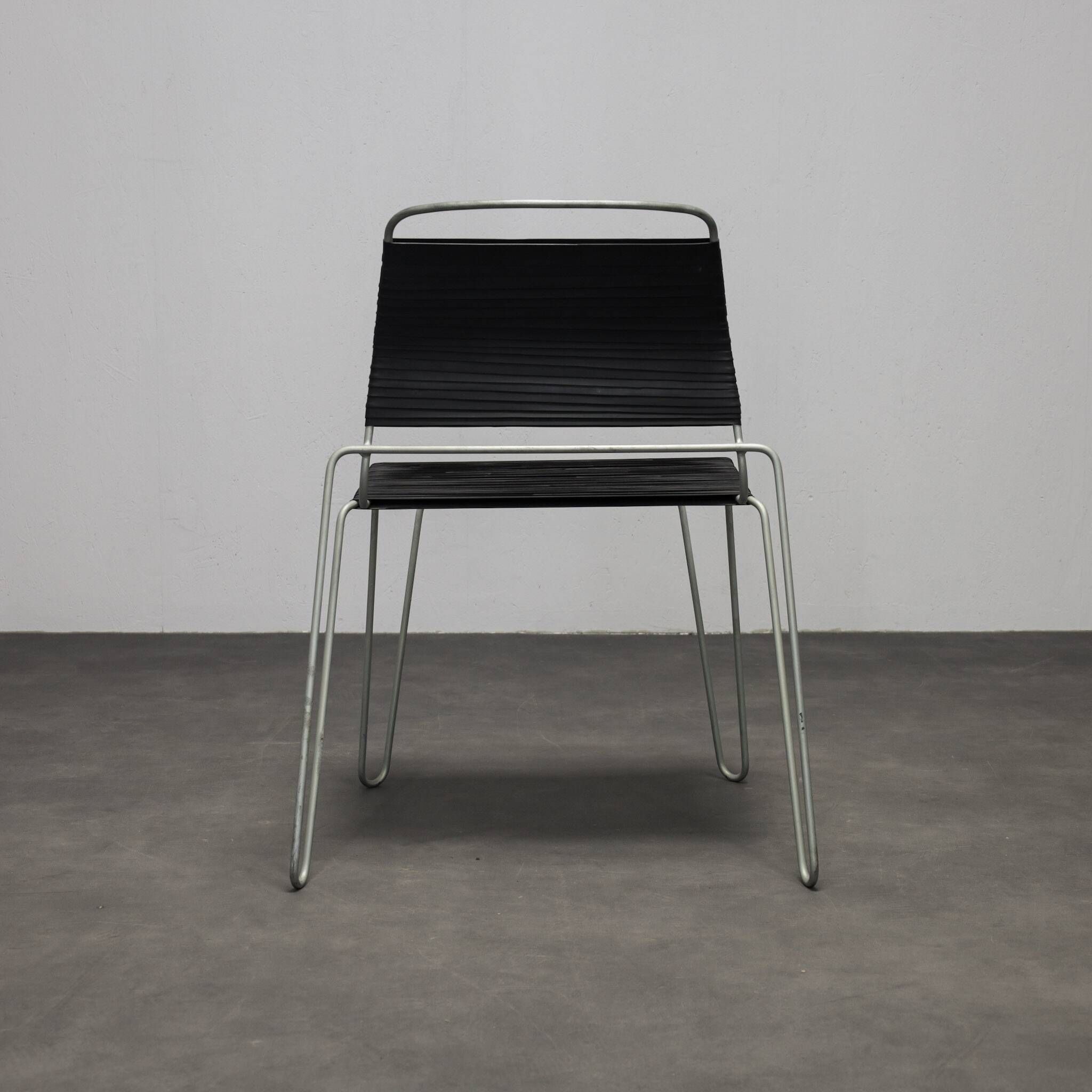 Rare pair of “Rubber Band” chairs by Tom Dixon