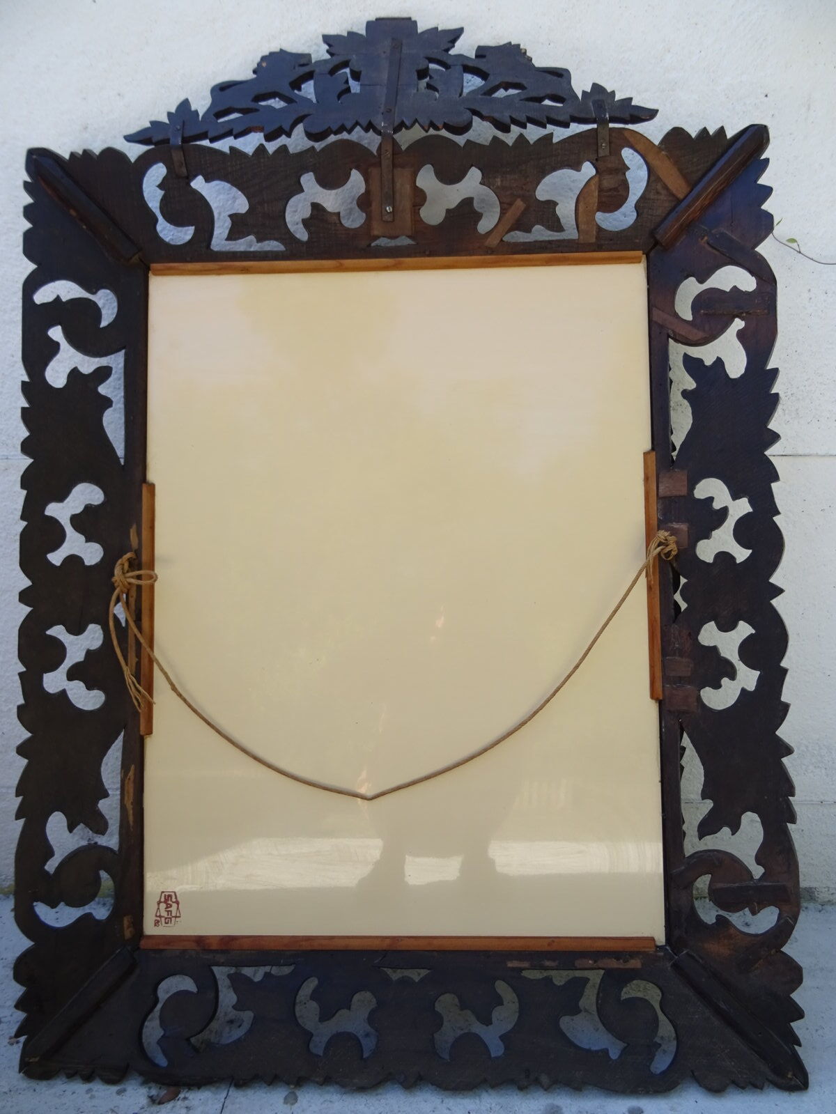 Miroir sculpté fronton lions