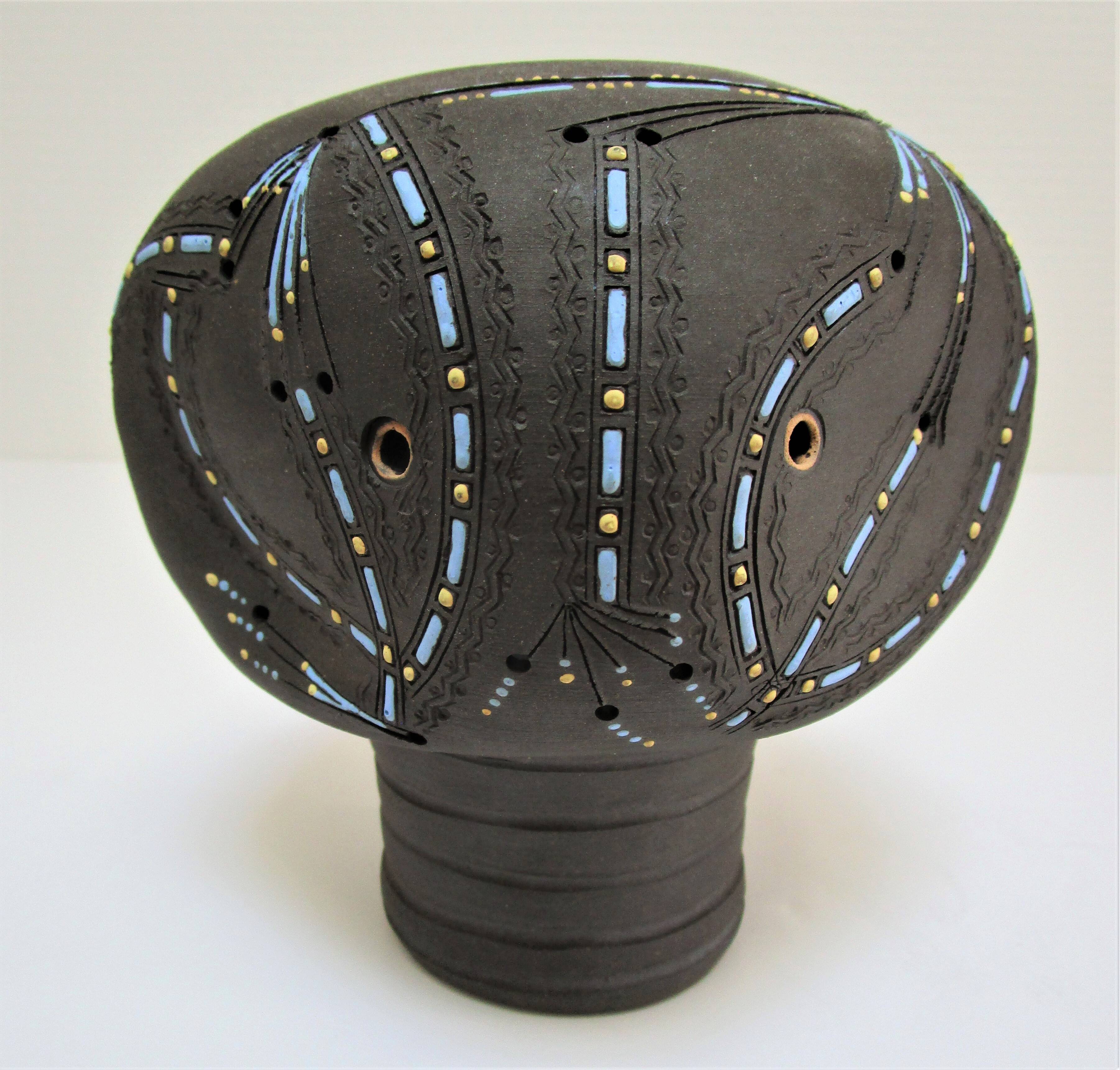 Anthropomorphic candle holder, scarified ceramic, stamped design