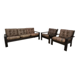 Living room sofa and brutalist armchairs in leather and wood, 70s, chalet style