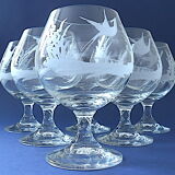 Suite of six tasting glasses of engraved crystal cognac
