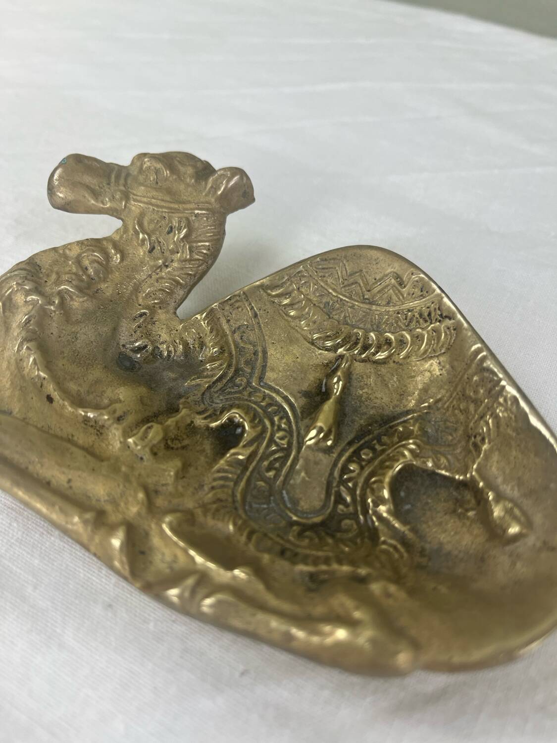 Brass pocket emptier