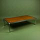 Vintage 1970s coffee table in chrome and burl wood.