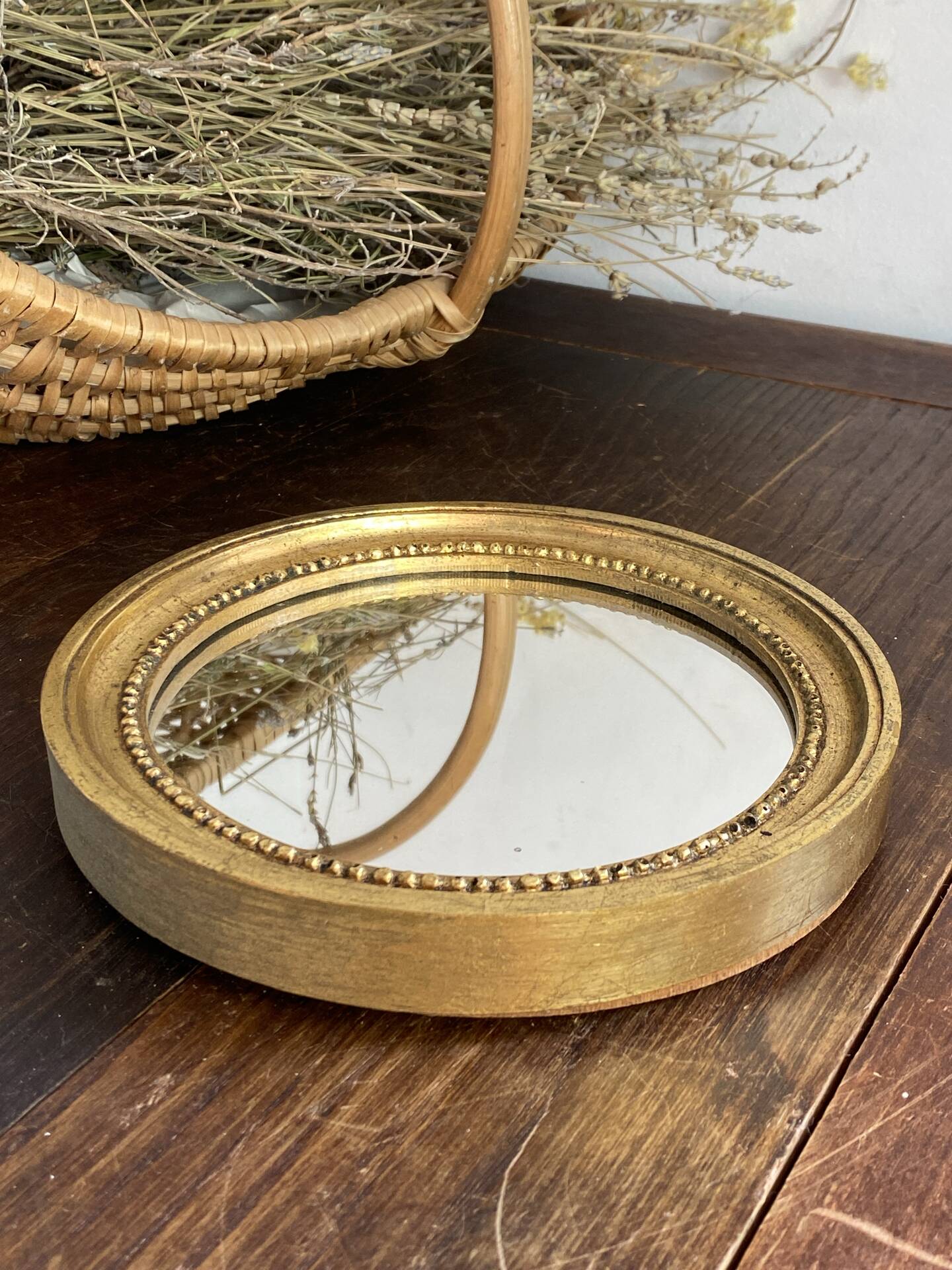 Miroir rond en bois de couleur dorée