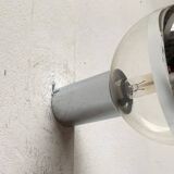 Vintage wall lamp from the German space age by Motoko Ishii for Staff, 1970s.