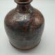 Vase bottle in sandstone pyrity