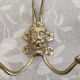 set of 5 gold metal hooks