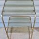 End table in gold metal and smoked glass