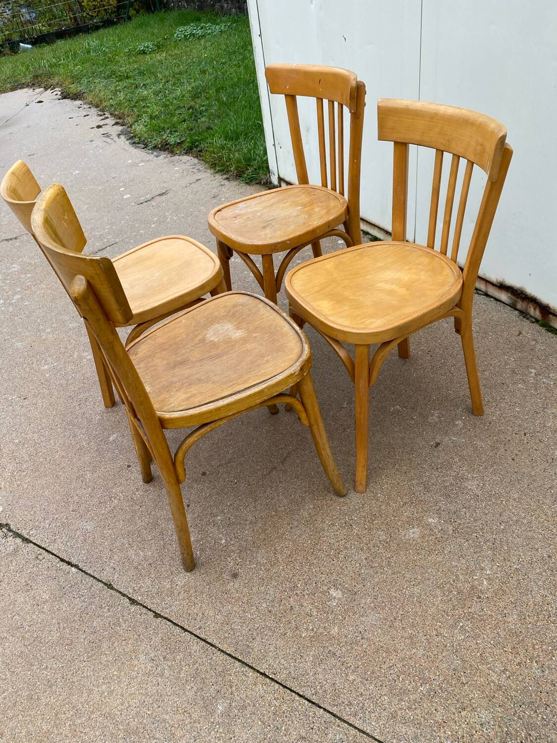 Curved varnished bistro chairs