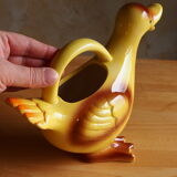Ceramic watering can in white earthenware, yellow enamel and bird shape