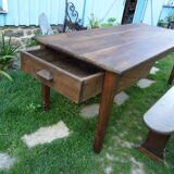 Farmhouse table and its two benches, chestnut, early 20th century