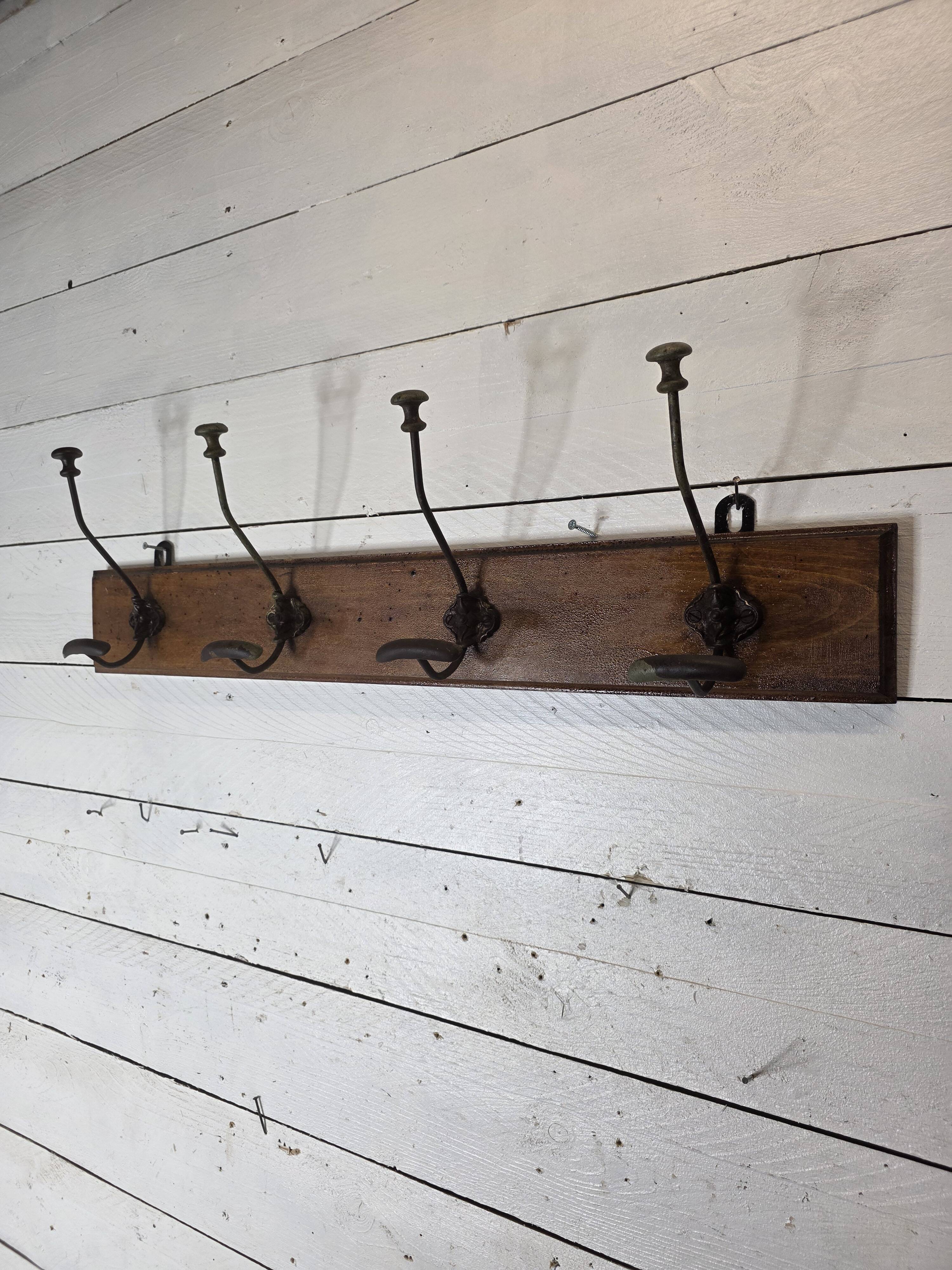 Old coat rack with 4 hooks