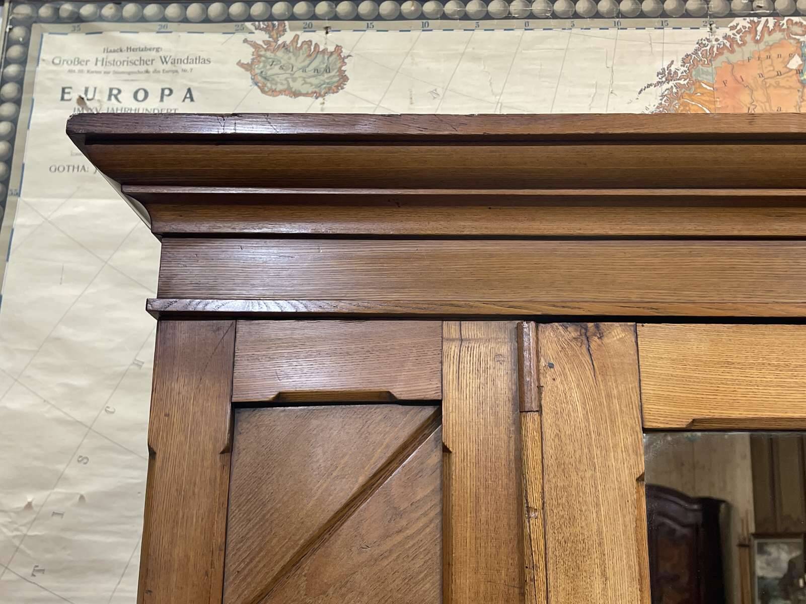 English oak wardrobe from the early 20th century.