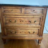 Antique wooden order with black marble top