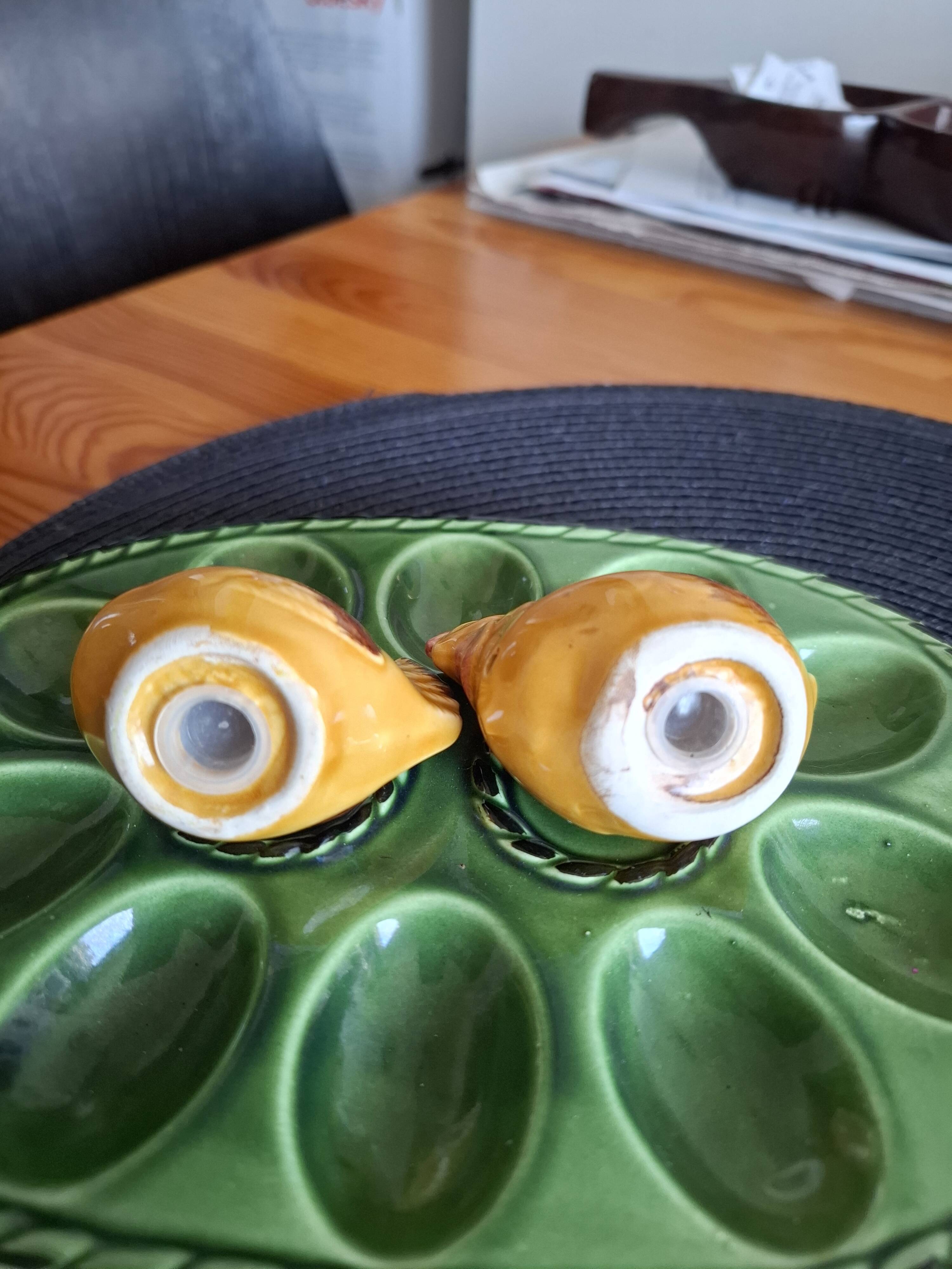 Earthenware egg dish with chicken-shaped salt and pepper shakers
