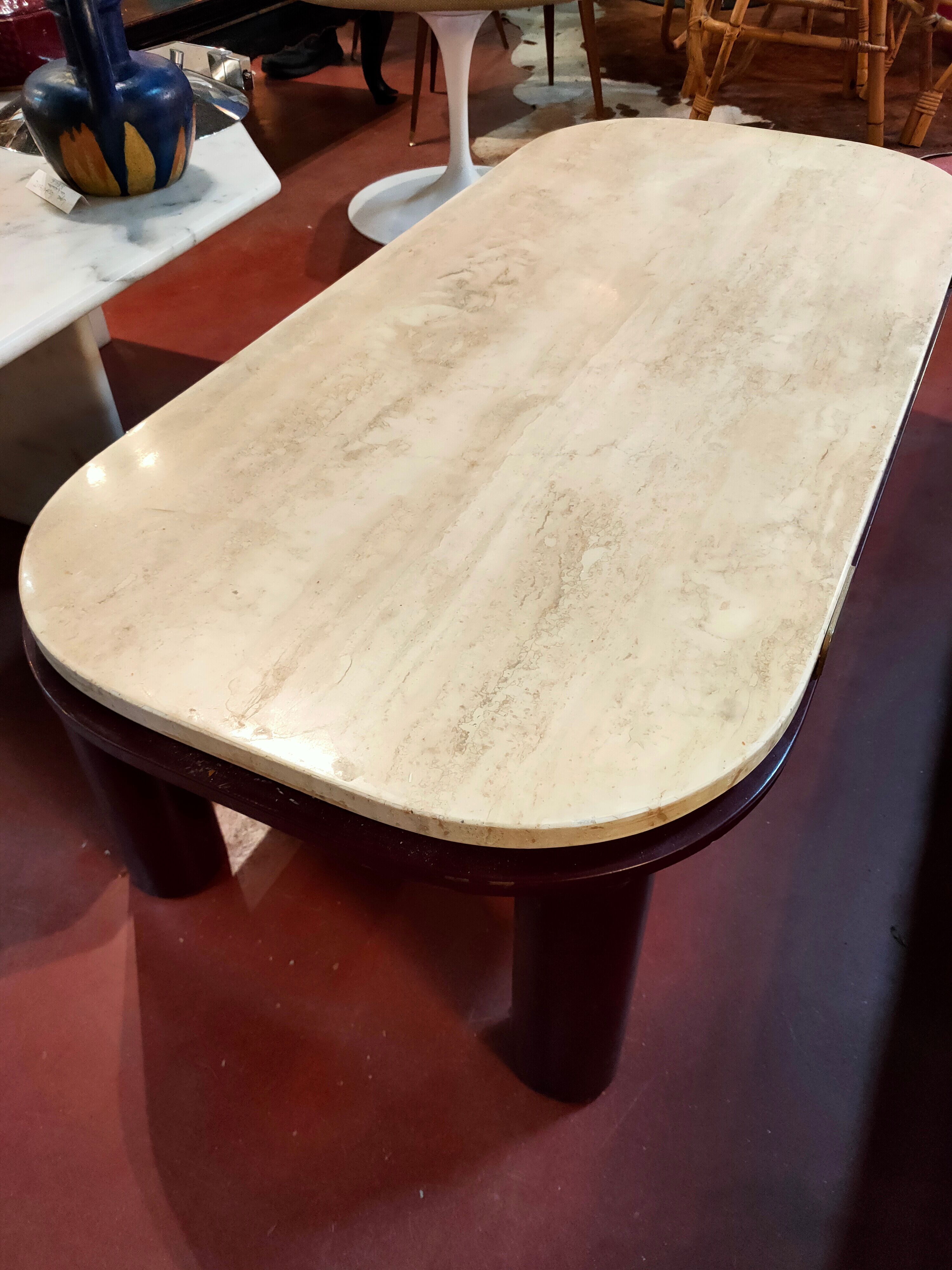 Coffee table Travertine top, garnet-colored metal stand and legs.  Long