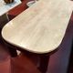 Coffee table Travertine top, garnet-colored metal stand and legs.  Long