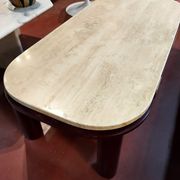Coffee table Travertine top, garnet-colored metal stand and legs.  Long