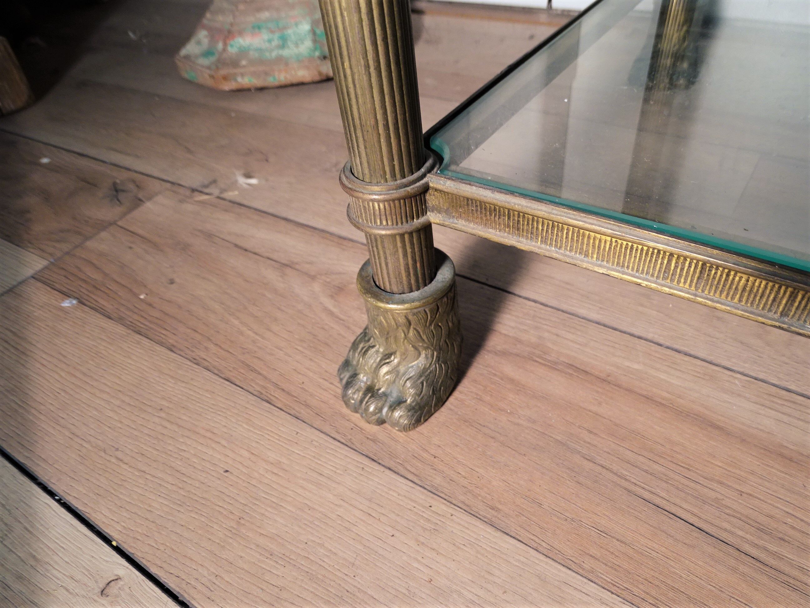 Pair of brass and gilded bronze shelves feet lion's feet