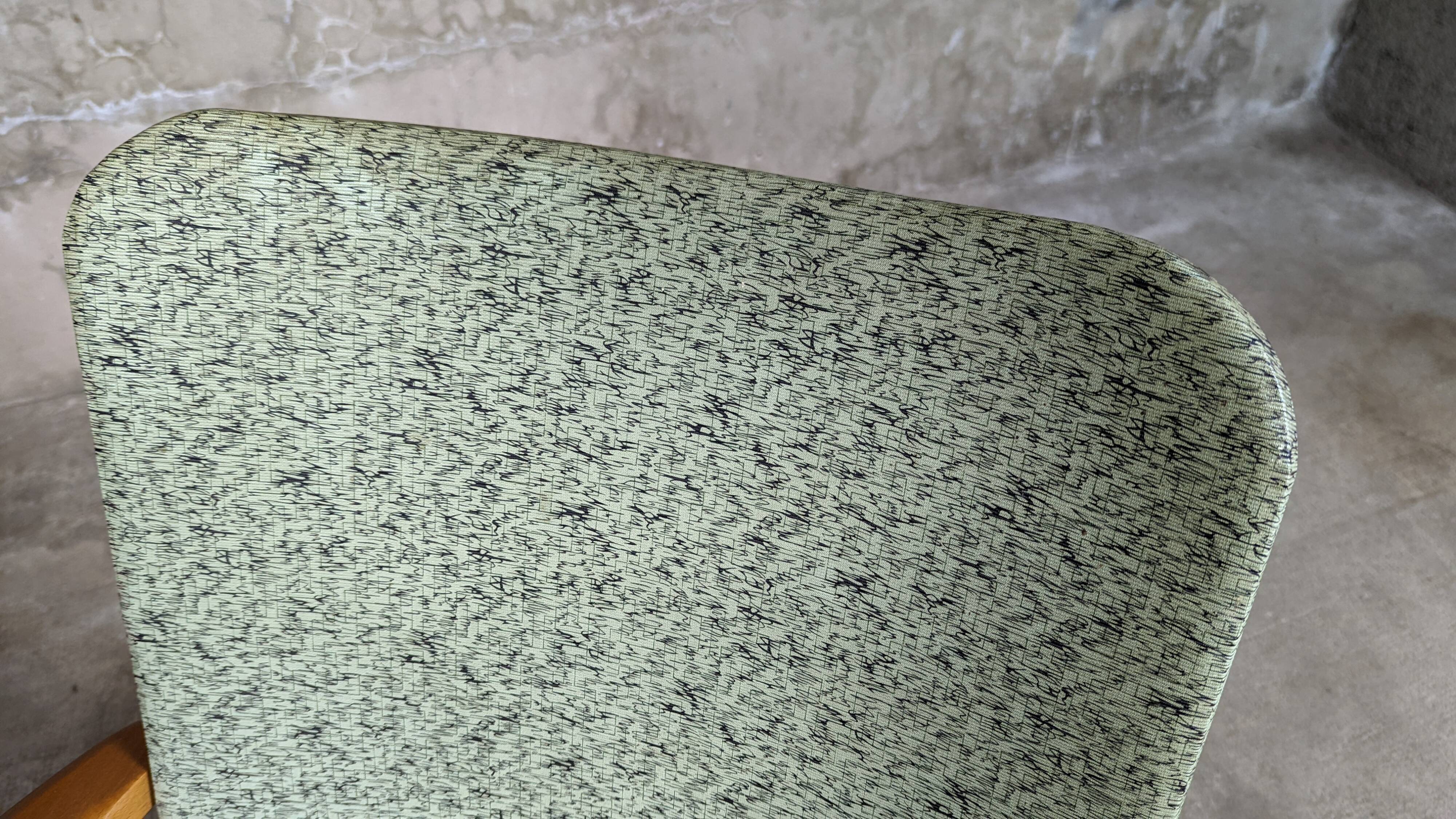 Scandinavian compass foot armchair