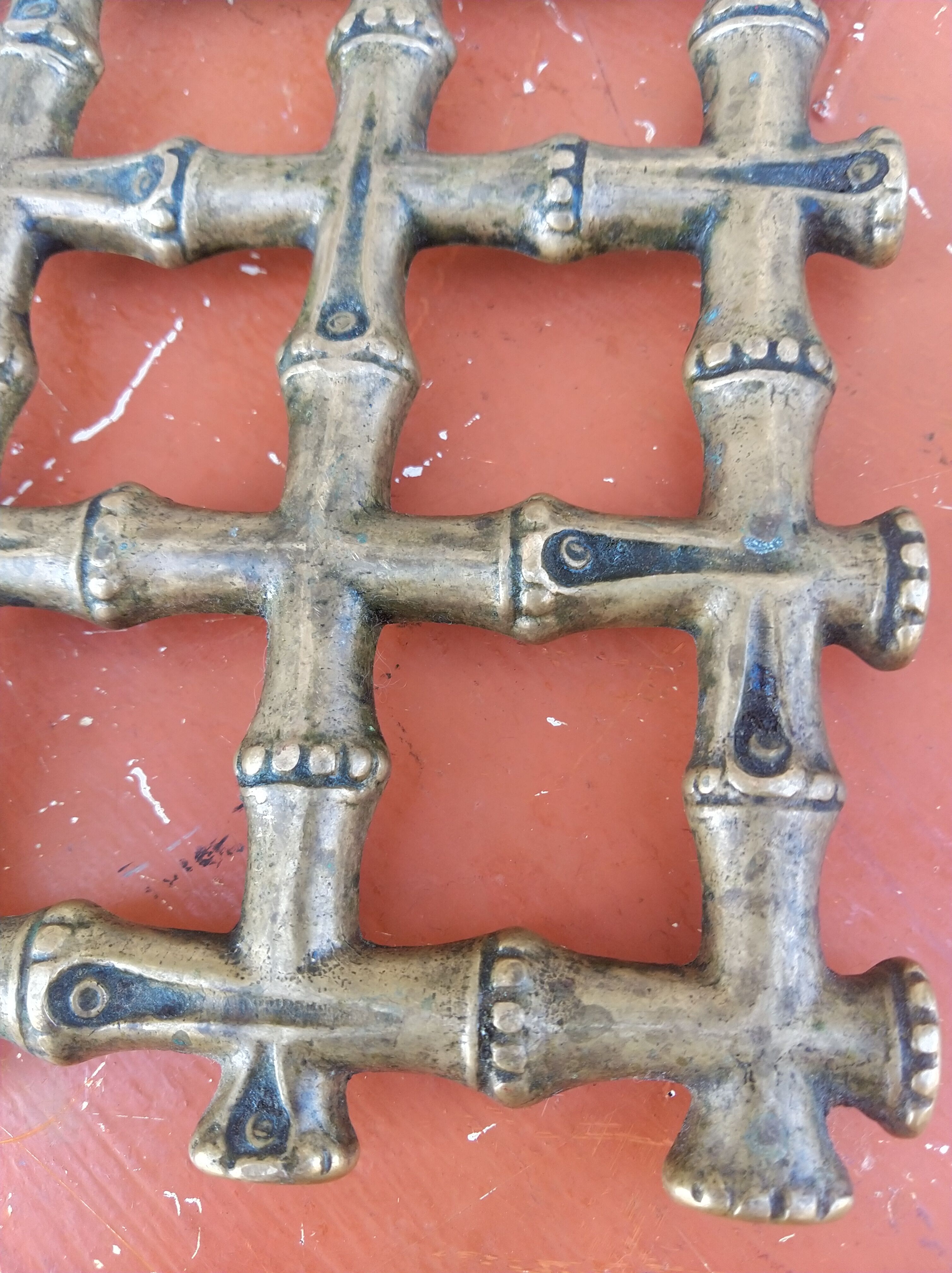 Bronze trivet in the style of bamboo, circa 1960