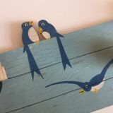 Coat rack with vintage swallows
