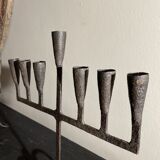 Pair of beaten iron candlesticks