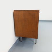 Vintage modernist enfilade in rosewood and chrome metal from the 60s and 70s.