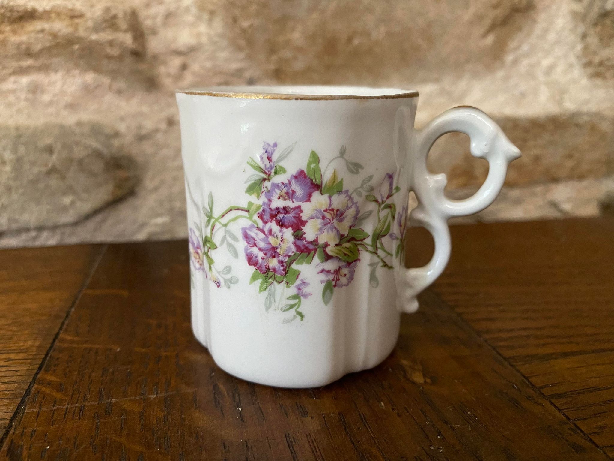 Porcelain cup fine decoration flowers and golden edge
