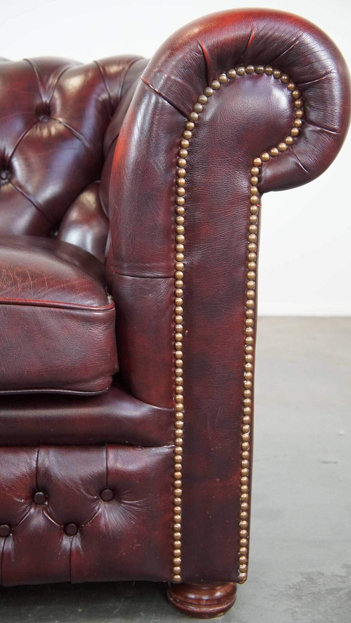Original English Chesterfield sofa in red cowhide 2 seater