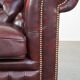 Original English Chesterfield sofa in red cowhide 2 seater
