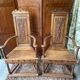 Pair of carved walnut armchairs in Renaissance style