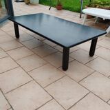 Old vintage wooden coffee table with tubular base