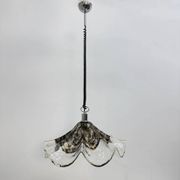 Glass and metal lamp